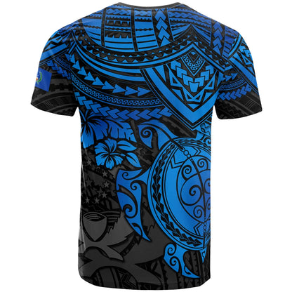 blue and black tribal-patterned t-shirt with turtle and floral designs.