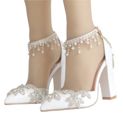 Luxury white lace pumps with rhinestone details and comfortable thick heel - perfect for resort evenings