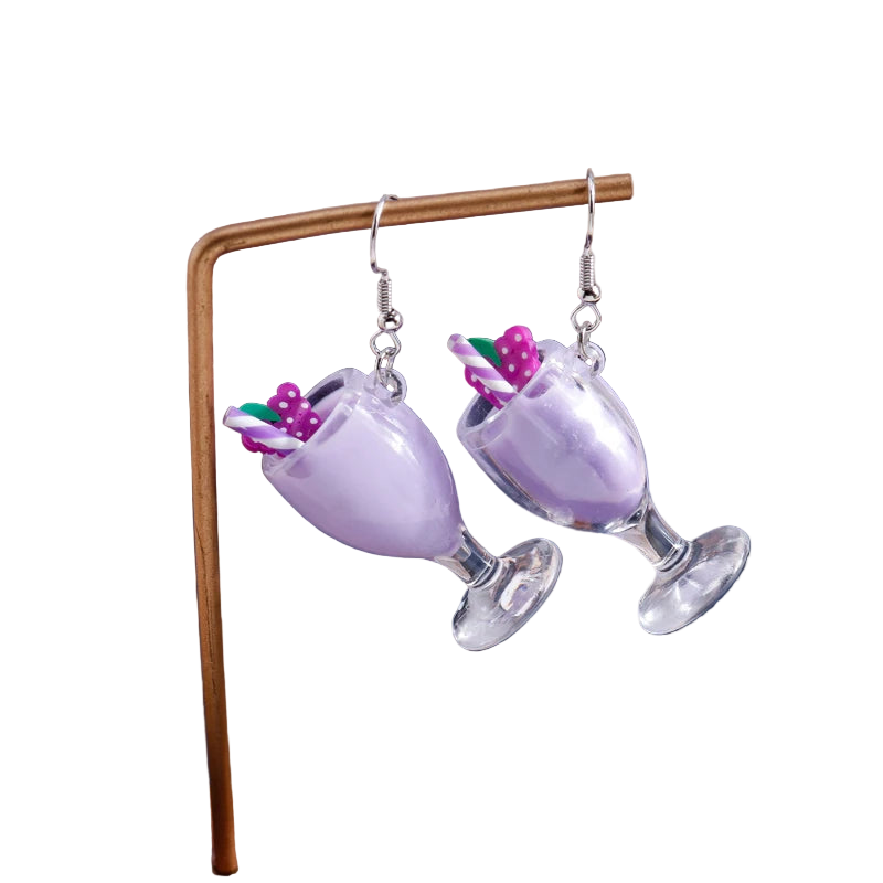 Mimosa glass earrings with pink drink and umbrella on a stand