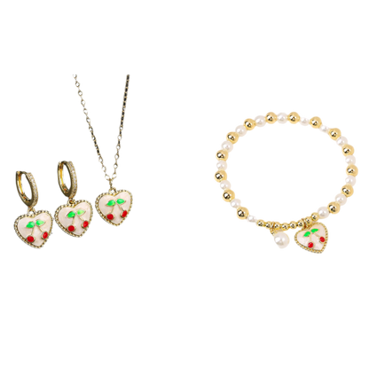 Jewelry set with heart-shaped earrings, necklace, and bracelet on a black and white background