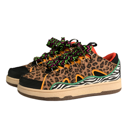 Luxury men's leopard print platform sneakers featuring vulcanized construction and elevated design for resort theme nights

