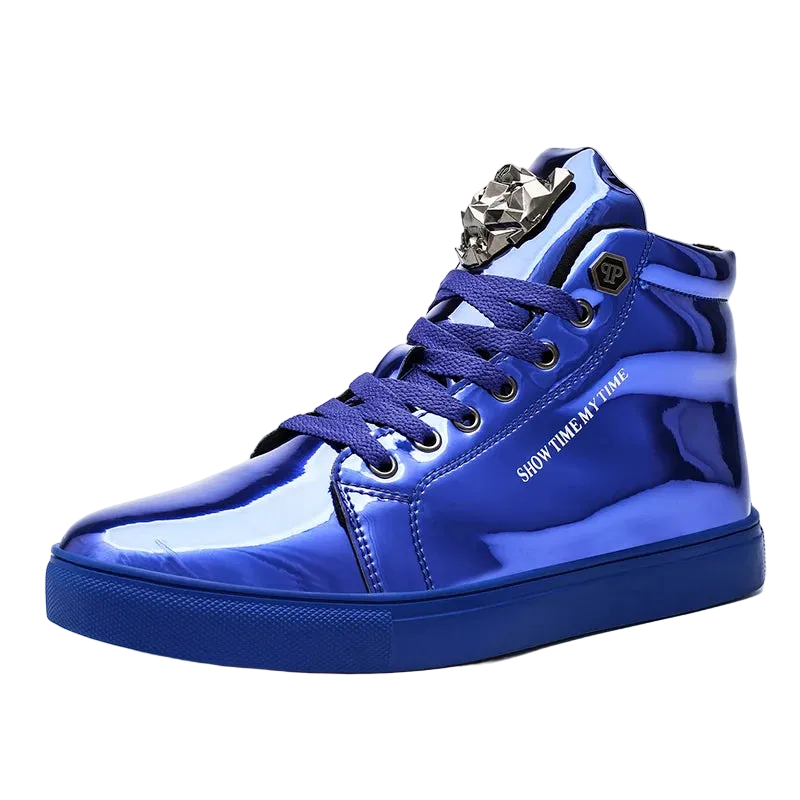 A shiny royal blue high-top sneaker with matching blue laces, a sculpted metallic lion head on the tongue, and 'SHOW TIME IN MY TIME' printed on the side, shown against a plain white background.