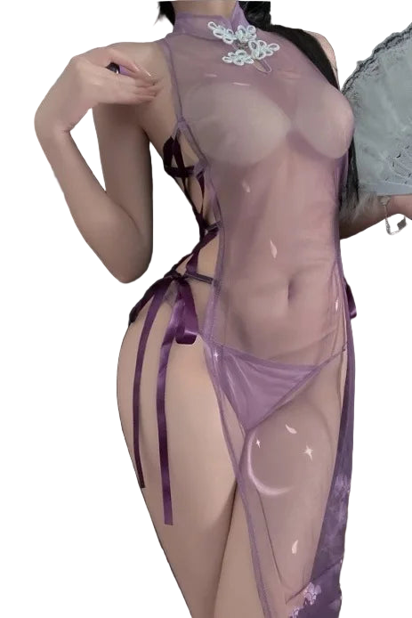 Person wearing a sheer purple lingerie set with floral details.