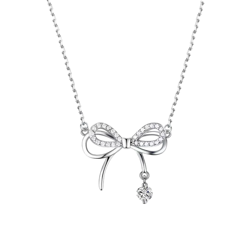 Silver bow-shaped necklace with a small pendant on a white background
