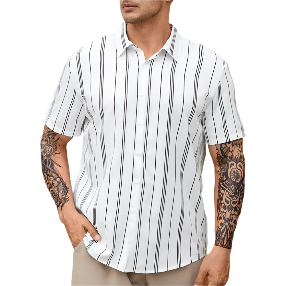 Man wearing a white short-sleeve shirt with black vertical stripes, standing outdoors.