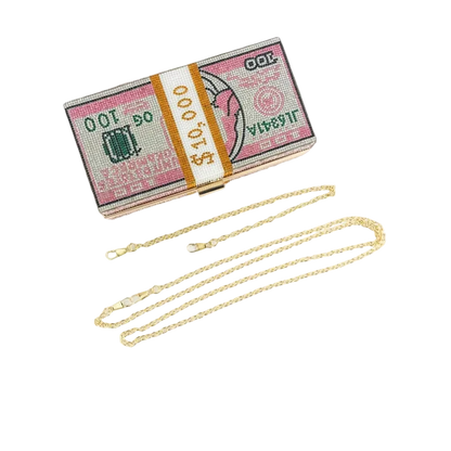 Money-themed clutch bag with a gold chain on a white background
