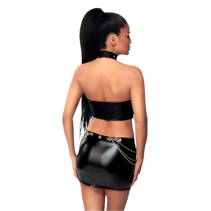 Woman wearing a black leather outfit on a white background