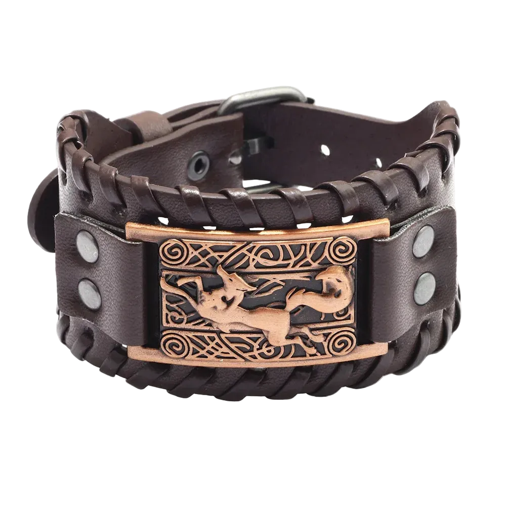 Brown leather bracelet with bronze decorative clasp on a white background