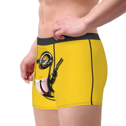 Yellow boxer briefs featuring minions a cartoon character in a suit holding guns.