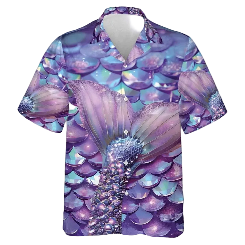 A short-sleeve button-up camp shirt featuring an all-over mermaid tail and scale print in shades of purple, blue, and pink, displayed on a clean white background.