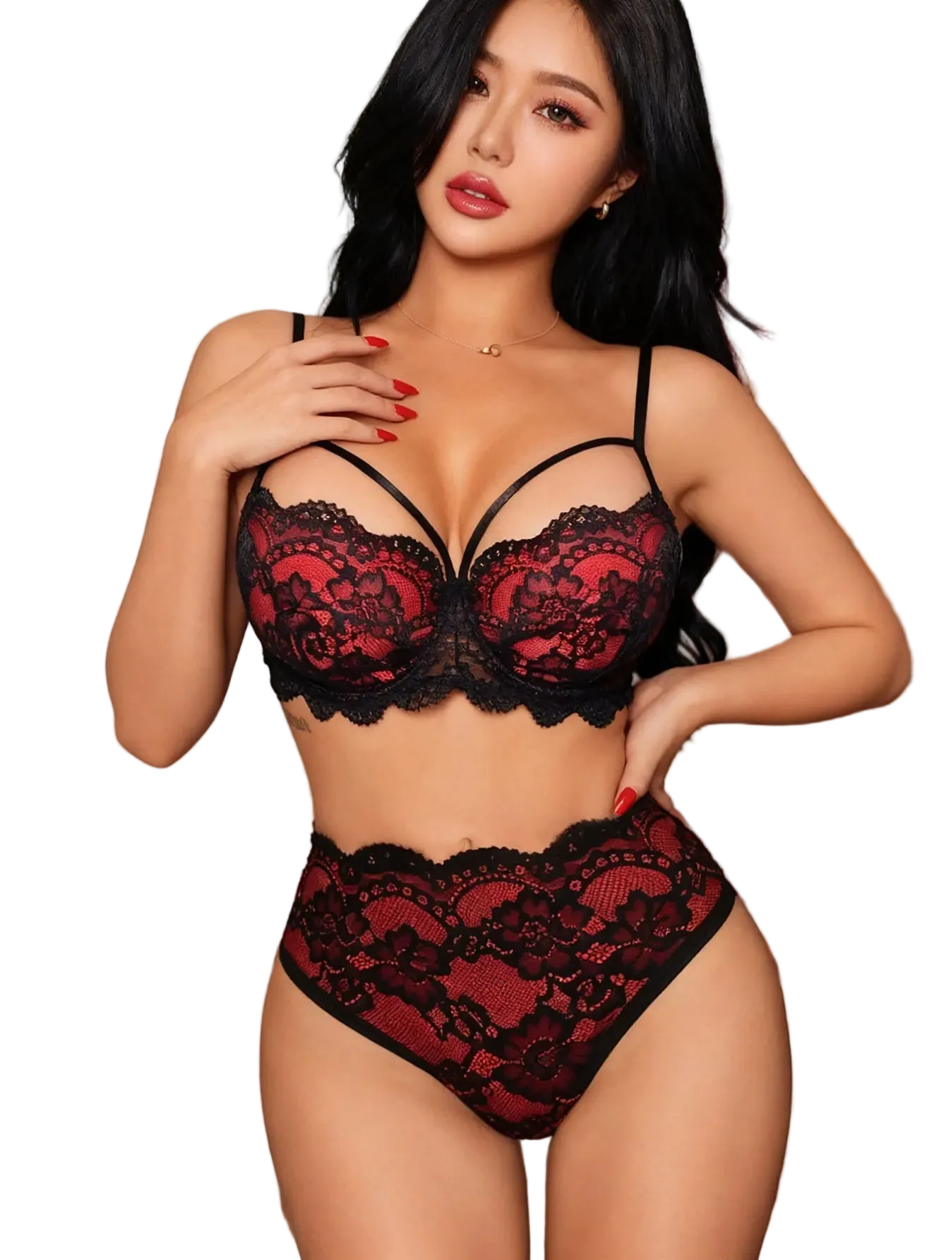 Woman wearing a black and red lace lingerie set indoors.