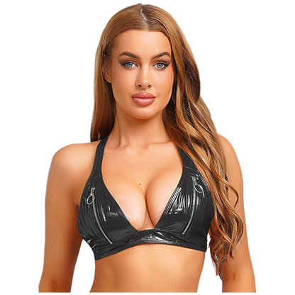 Woman wearing a black vinyl bralette on a white background