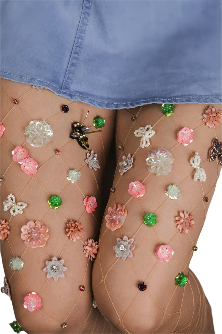 Crystal embellished fishnet pantyhose with floral decoration and rhinestone details for resort theme nights

