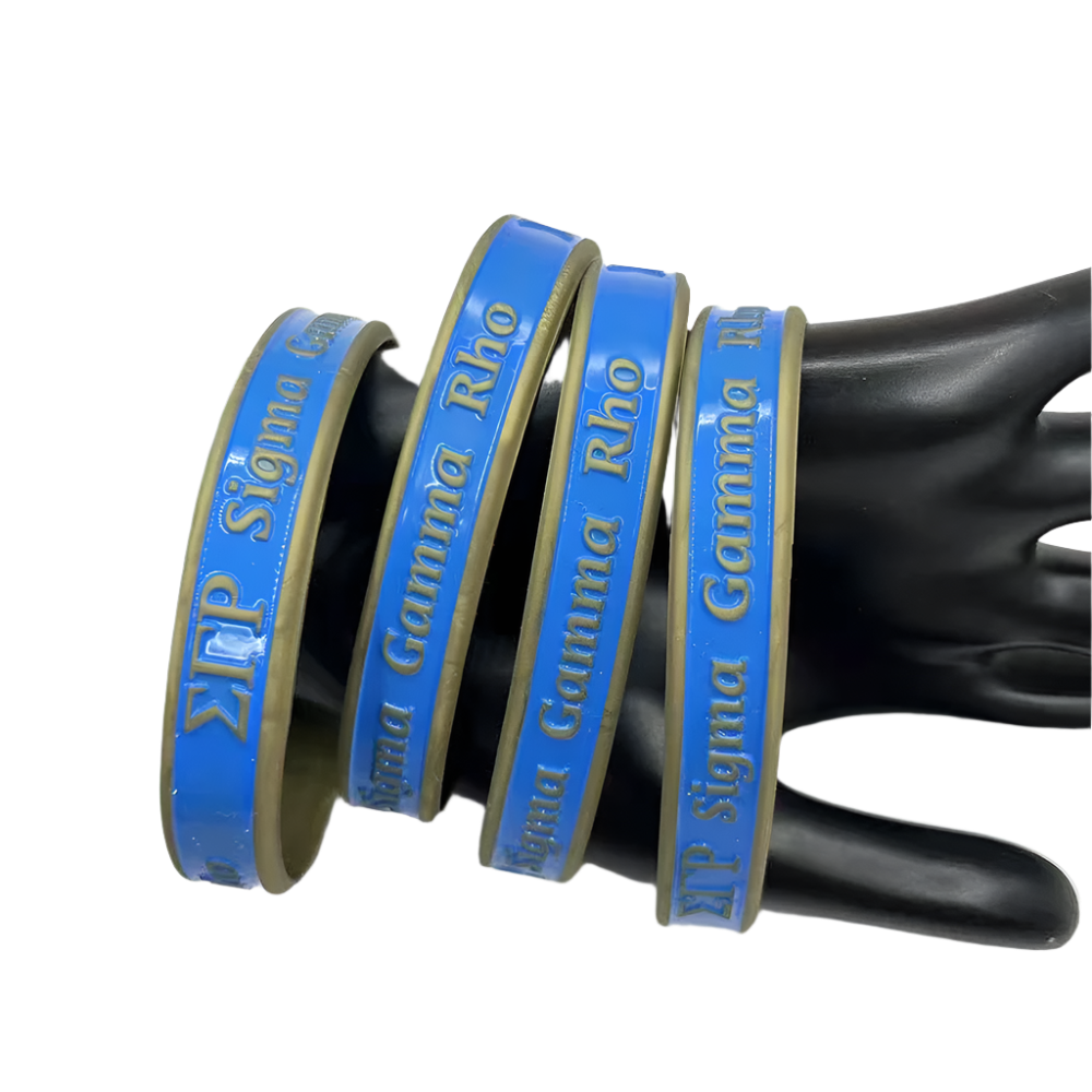Blue and gold ribbons with 'Sigma Gamma Rho' text on a black mannequin hand against a white background.