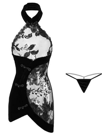 Black and white lace dress with matching garter on a white background