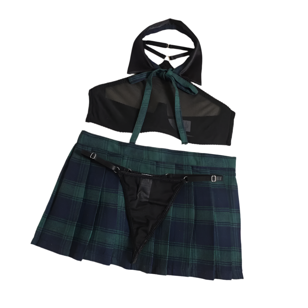 Black sheer top and plaid skirt on a beige background with flowers.