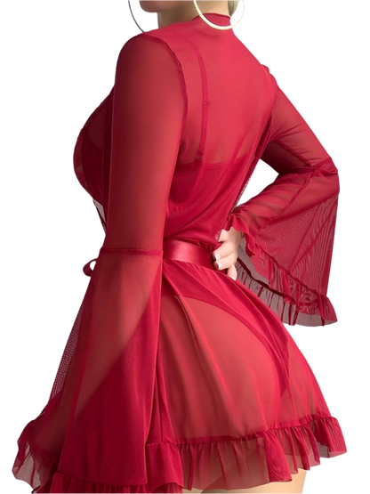 Red dress with sheer sleeves and hem on a plain background