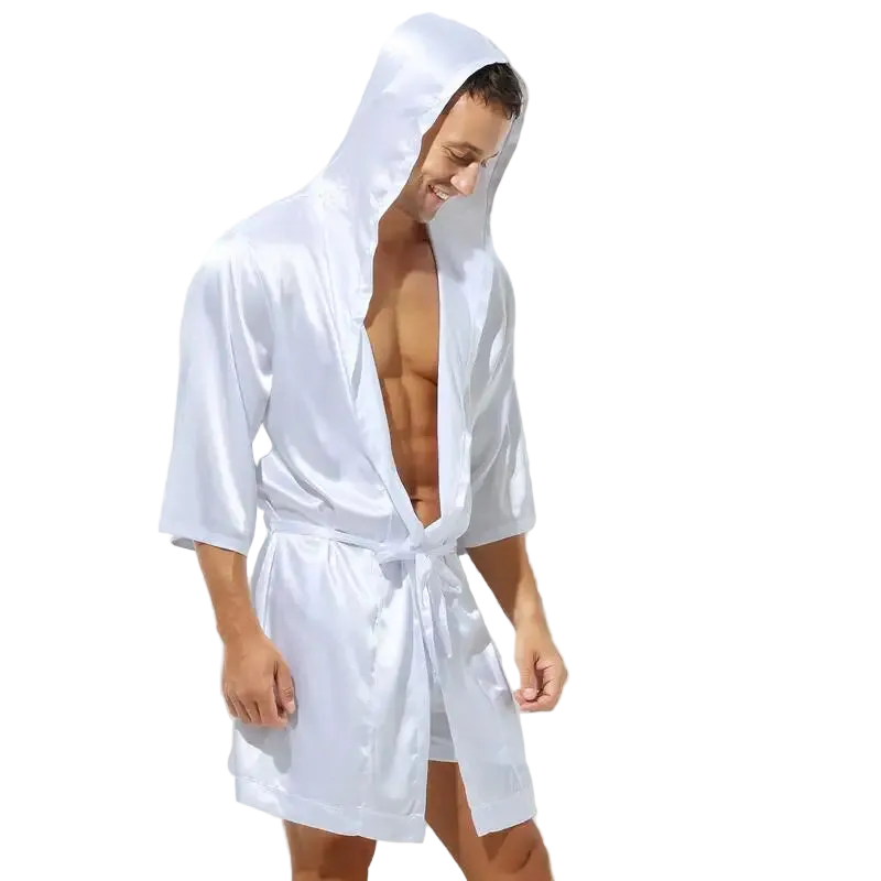 Man wearing a white hooded robe on a white background