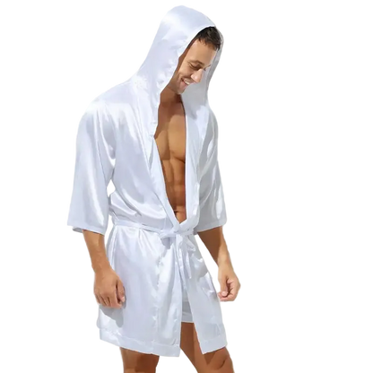 Man wearing a white hooded robe on a white background