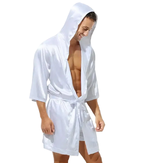 Man wearing a white hooded robe on a white background