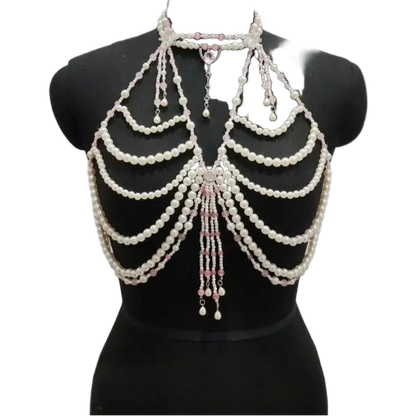 Pearl and crystal body chain on a mannequin against a white background