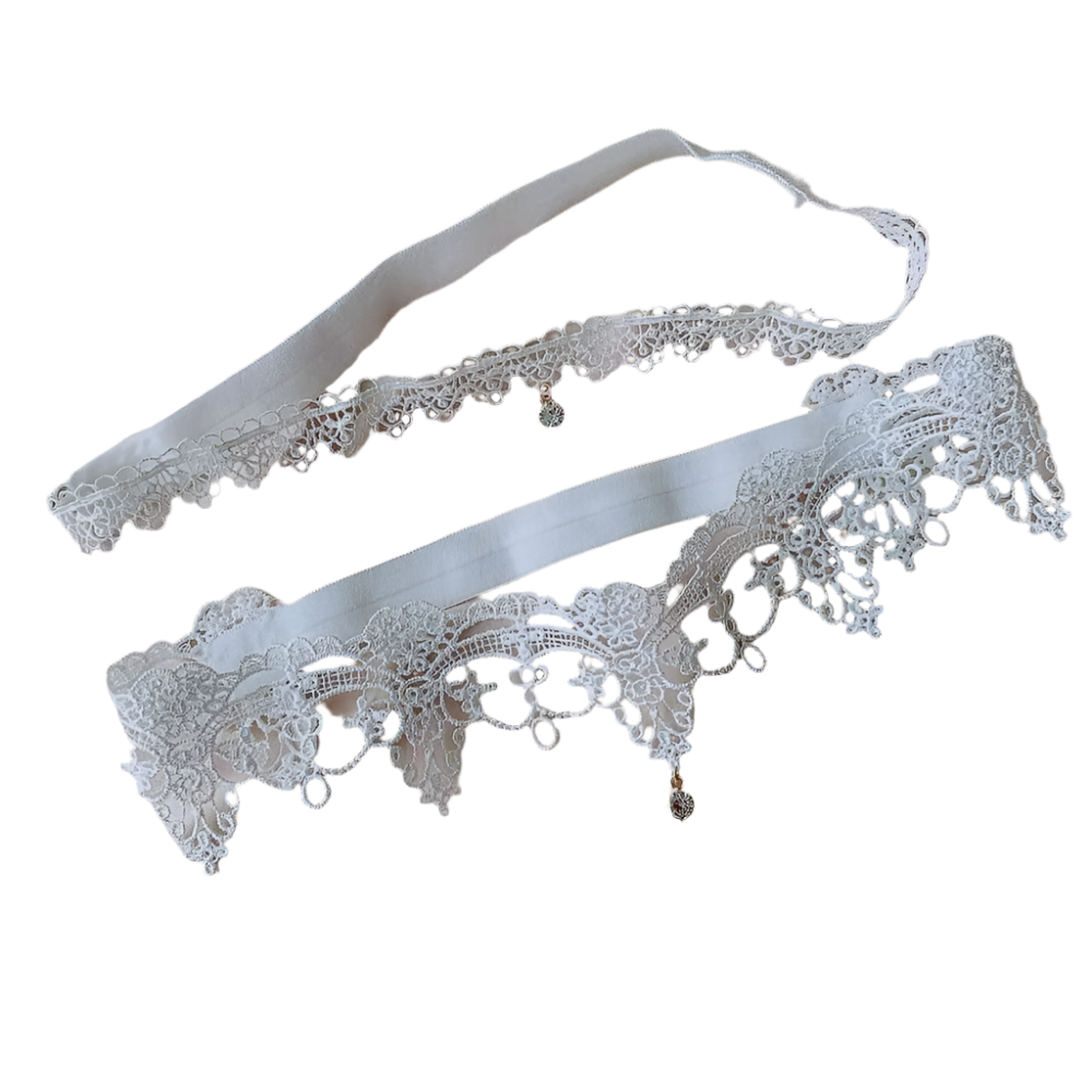 Crystal pendant lace garters with decorative thigh bands in white and black for resort evenings

