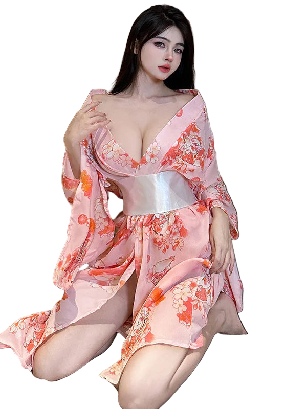Woman in a pink floral kimono sitting on a couch.