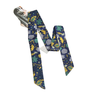 Floral-patterned tie on a white background