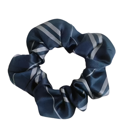 Navy blue scrunchie with gray stripes on a white background