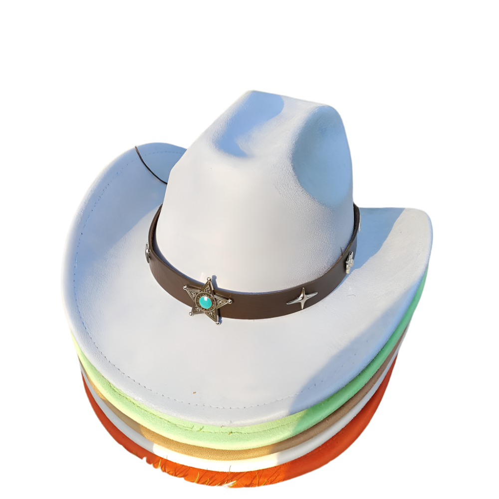 Stack of colorful cowboy hats with a star-adorned band on grass