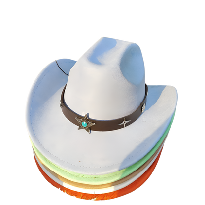 Stack of colorful cowboy hats with a star-adorned band on grass