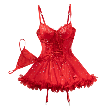 Red lace lingerie set on a white background with flowers and a book.