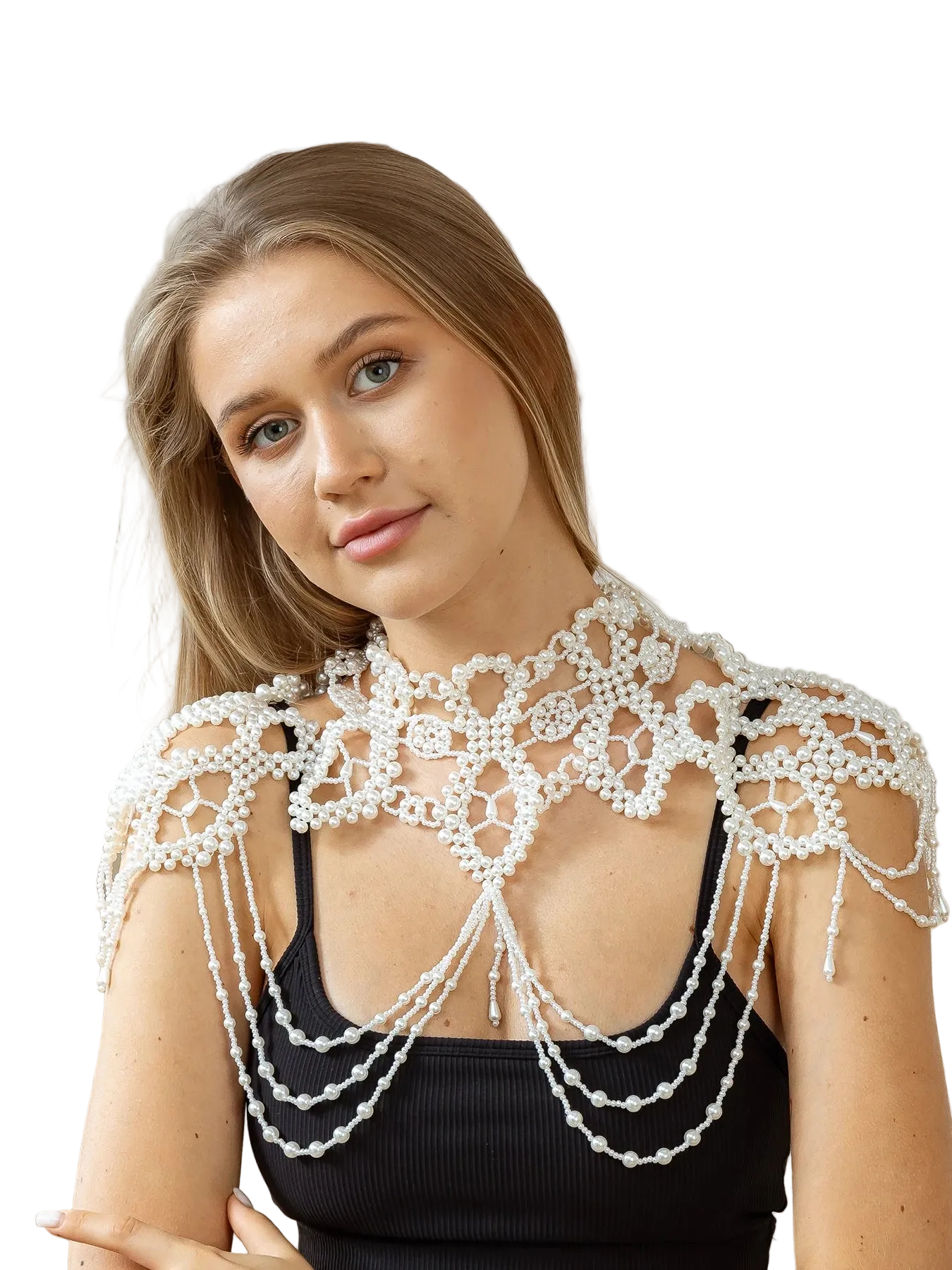 Woman wearing a decorative white pearl garment against a neutral background