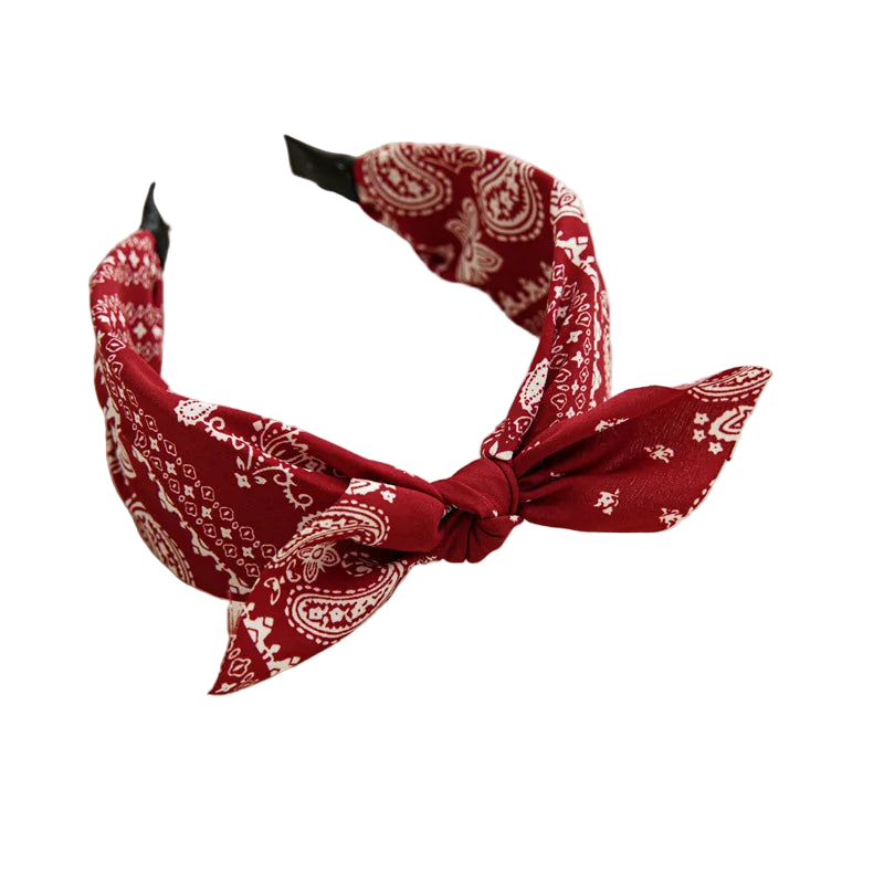Red bandana headband on a white surface