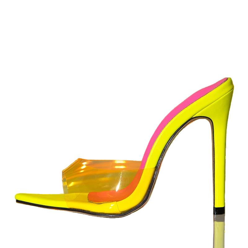 Neon yellow high-heeled shoe with pink interior on a reflective surface