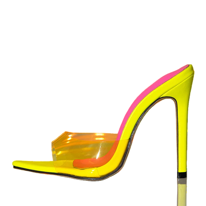 Neon yellow high-heeled shoe with pink interior on a reflective surface