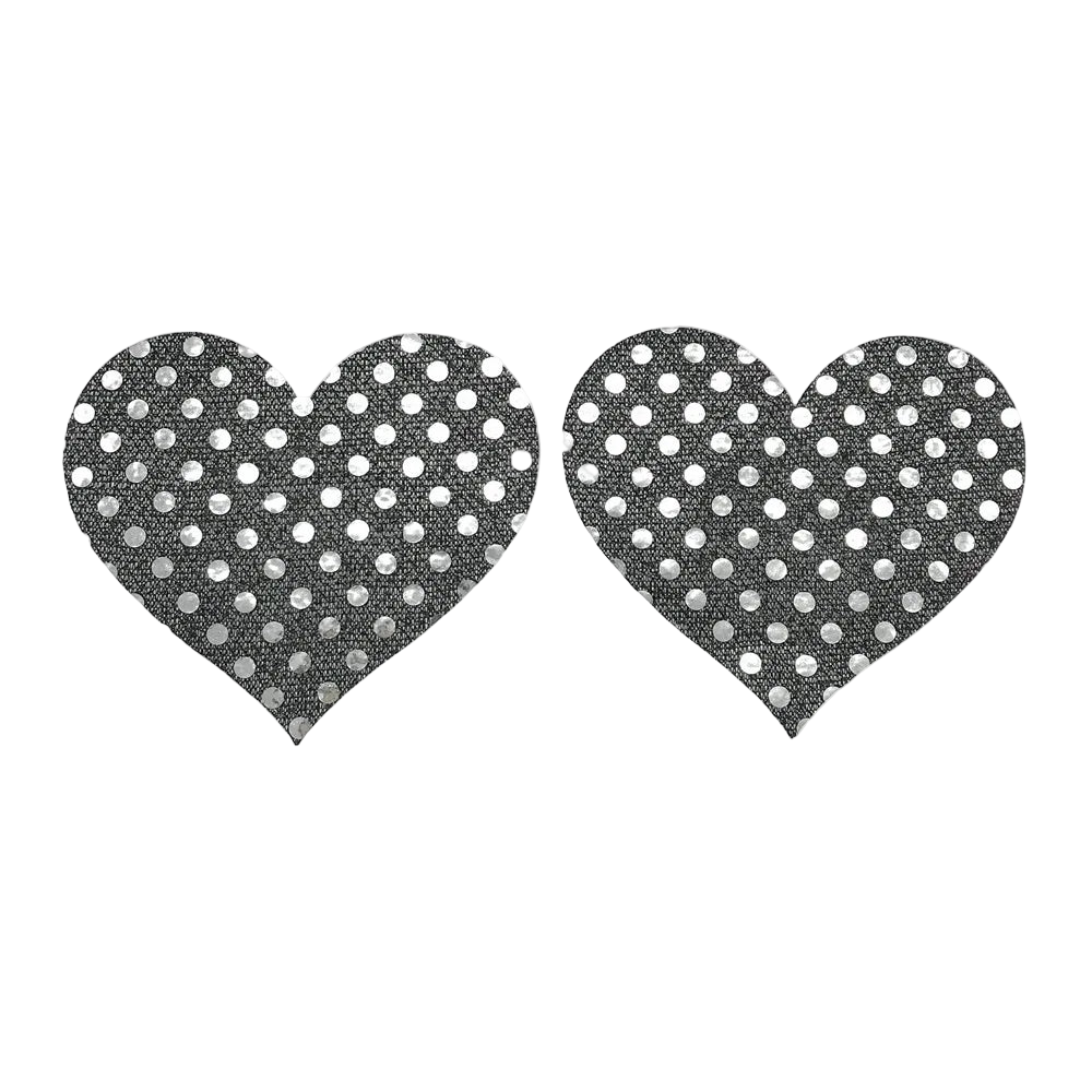 Heart-shaped black pasties with white polka dots on a white background